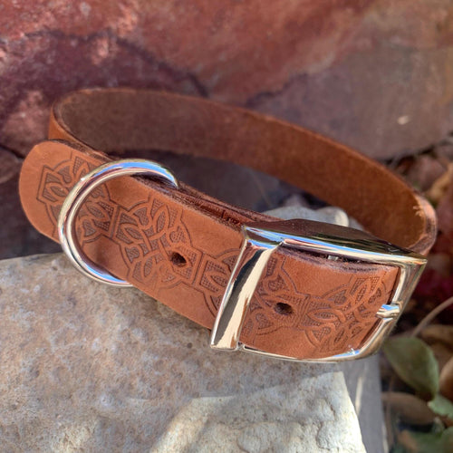 Brown leather collar with Celtic knots.