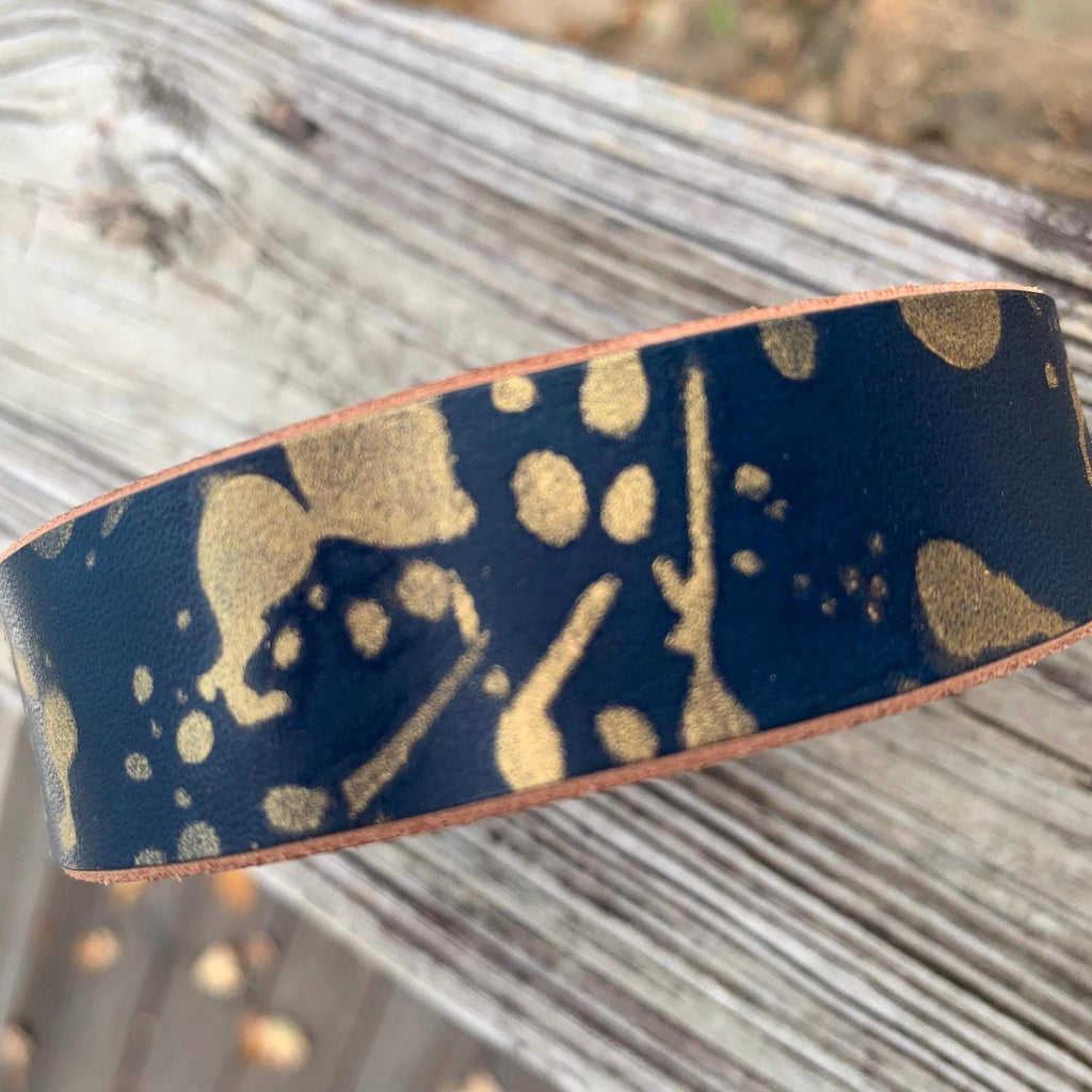 Navy blue leather dog collar with gold drip paint.