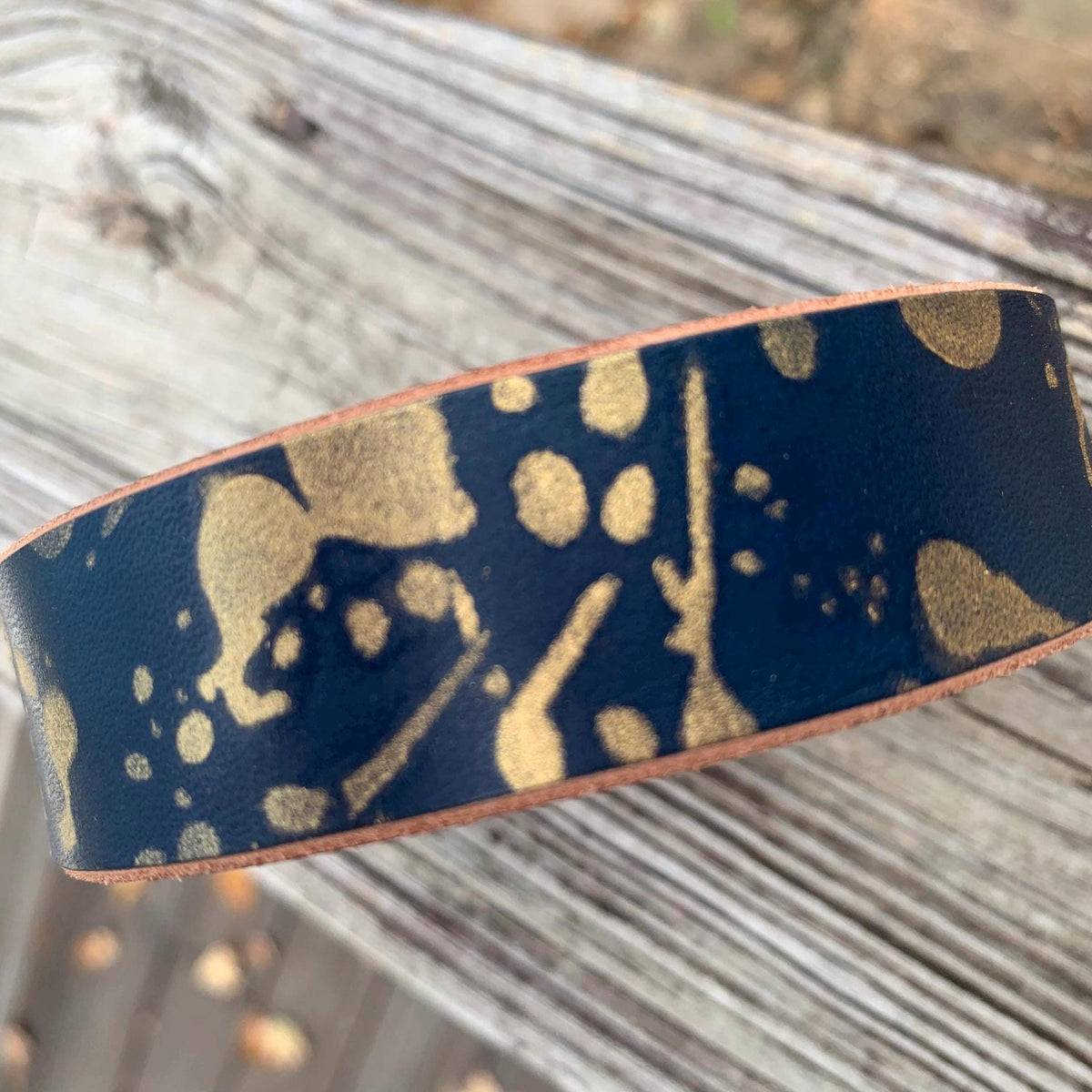 Navy blue leather dog collar with gold drip paint.