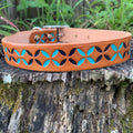 Colorful leather dog collar that is hand painted dark blue and teal.