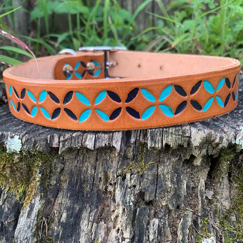 Colorful leather dog collar that is hand painted dark blue and teal.