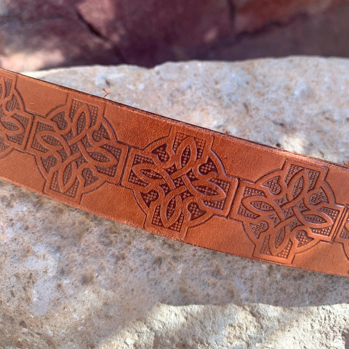 Brown leather collar with Celtic knots.